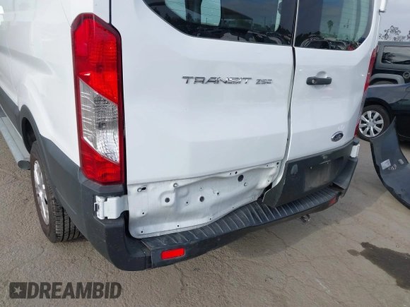 2021 Ford Transit Cargo with VIN 1FTBR1Y85MKA69355, listed as a IAAI auction lot 42544780 with 33,288 mi miles and . Bid and sale history available at DreamBid. Image 6.