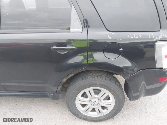 2008 Mercury Mariner Premier with VIN 4M2CU97178KJ34471, listed as a IAAI auction lot 42087155 with 172,178 mi miles. Bid and sale history available at carsss.com. Image 6.