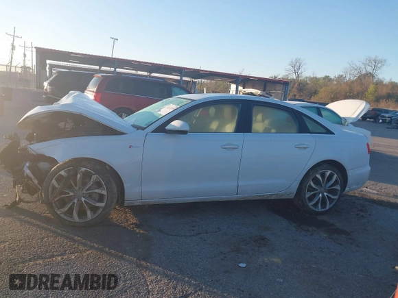 2013 Audi A6 Premium Plus z VIN WAUGGAFC6DN080377, wystawiony jako IAAI lot #41132555 z przebiegiem Nie podano mil oraz . Historia ofert i sprzedaży dostępna na DreamBid. Obrazek 13.