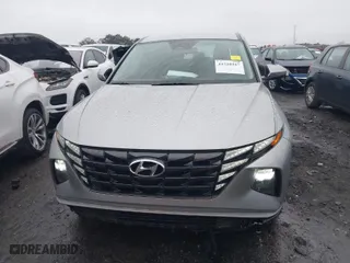 2022 Hyundai Tucson SE with VIN 5NMJA3AEXNH069489, listed as a IAAI auction lot 41520347 with 100,657 mi miles. Bid and sale history available at carsss.com. Image 12.