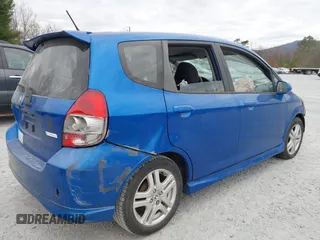 2007 Honda Fit Sport z VIN JHMGD38687S009331, wystawiony jako IAAI lot #40875326 z przebiegiem 151 175 mil mil oraz . Historia ofert i sprzedaży dostępna na DreamBid. Obrazek 14.