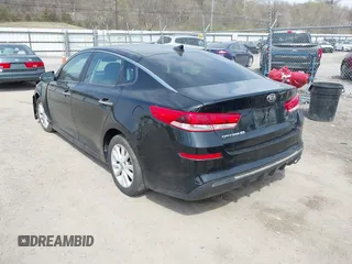 2019 Kia Optima LX with VIN 5XXGT4L33KG373375, listed as a IAAI auction lot 42005817 with 77,524 mi miles and . Bid and sale history available at carsss.com. Image 3.