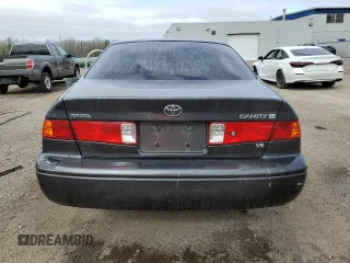 2001 Toyota Camry LE z VIN JT2BF22K010295564, wystawiony jako Copart lot #55111755 z przebiegiem 379 337 mil mil oraz Szkody całkowita. Historia ofert i sprzedaży dostępna na DreamBid. Obrazek 6.