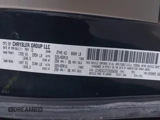 2012 Dodge Grand Caravan SXT with VIN 2C4RDGCG7CR358266, listed as a IAAI auction lot 41582428 with 169,137 mi miles and . Bid and sale history available at DreamBid. Image 9.