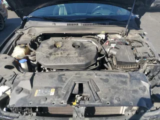 2020 Lincoln MKZ Standard z VIN 3LN6L5A97LR614023, wystawiony jako Copart lot #55066965 z przebiegiem 144 760 mil mil oraz Szkoda całkowita • Salvage title. Historia ofert i sprzedaży dostępna na DreamBid. Obrazek 11.