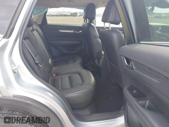 2017 Mazda CX-5 Grand Touring with VIN JM3KFBDL8H0227348, listed as a IAAI auction lot 41572377 with 124,908 mi miles. Bid and sale history available at carsss.com. Image 8.