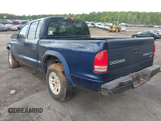 2004 Dodge Dakota Sport with VIN 1D7HL38K34S782067, listed as a IAAI auction lot 42012642 with 113,921 mi miles. Bid and sale history available at carsss.com. Image 3.