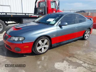 2005 Pontiac GTO with VIN 6G2VX12UX5L407635, listed as a IAAI auction lot 41768211 with 82,365 mi miles. Bid and sale history available at carsss.com. Image 17.