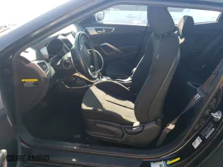 2017 Hyundai Veloster with VIN KMHTC6ADXHU306731, listed as a Copart auction lot 63019084 with 81,957 mi miles and Clean Title. Bid and sale history available at carsss.com. Image 7.