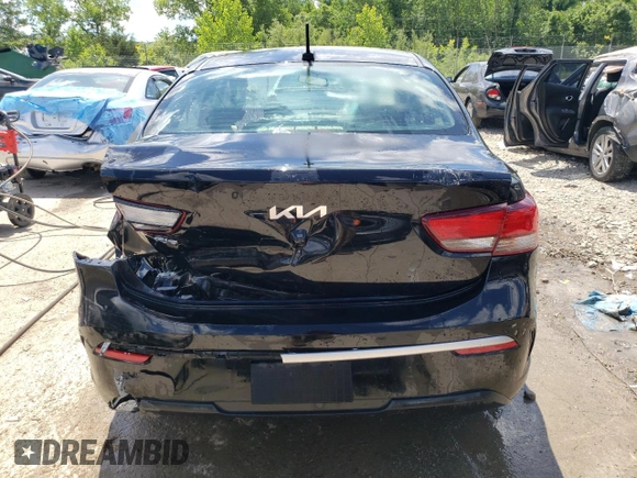 2022 Kia Rio S with VIN 3KPA24AD2NE463067, listed as a Copart auction lot 57944294 with 77,382 mi miles and Non Repairable. Bid and sale history available at DreamBid. Image 6.