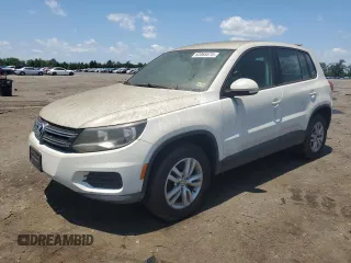 2014 Volkswagen Tiguan SEL z VIN WVGAV3AX6EW603358, wystawiony jako Copart lot #62065575 z przebiegiem 209 464 mil mil oraz Czysty tytuł • Clean title. Historia ofert i sprzedaży dostępna na DreamBid. Obrazek 1.
