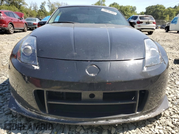 2004 Nissan 350Z Touring with VIN JN1AZ34E54T052703, listed as a Copart auction lot 70016184 with 170,619 mi miles and Salvage Title. Bid and sale history available at carsss.com. Image 5.