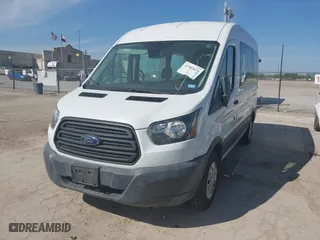 2018 Ford Transit Passenger Wagon XL with VIN 1FMZK1CM8JKB15873, listed as a IAAI auction lot 41985434 with 84,467 mi miles. Bid and sale history available at carsss.com. Image 17.