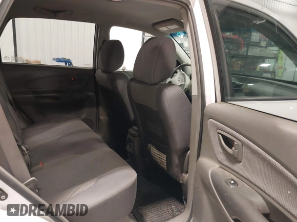 2006 Hyundai Tucson GL with VIN KM8JM72BX6U465737, listed as a IAAI auction lot 42203453 with 162,107 mi miles. Bid and sale history available at carsss.com. Image 8.