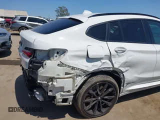 2021 BMW X4 xDrive30i with VIN 5UX2V1C07M9F78742, listed as a IAAI auction lot 42529383 with 40,786 mi miles and . Bid and sale history available at DreamBid. Image 6.