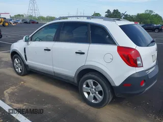 2014 Chevrolet Captiva Sport LS z VIN 3GNAL2EK0ES603331, wystawiony jako IAAI lot #42061441 z przebiegiem 128 041 mil mil oraz . Historia ofert i sprzedaży dostępna na DreamBid. Obrazek 3.
