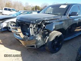 2015 Chevrolet Tahoe LT with VIN 1GNSCBKC5FR156050, listed as a IAAI auction lot 41486815 with 220,599 mi miles and . Bid and sale history available at DreamBid. Image 6.