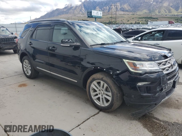 2018 Ford Explorer XLT with VIN 1FM5K8D84JGB94843, listed as a Copart auction lot 55755645 with 104,709 mi miles and Salvage title. Bid and sale history available at DreamBid. Image 4.