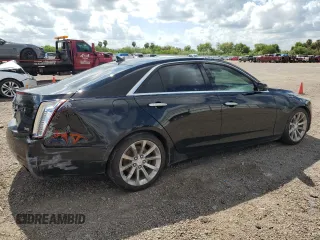 2014 Cadillac CTS Performance RWD with VIN 1G6AS5S33E0130965, listed as a Copart auction lot 60669564 with 28,435 mi miles and Salvage Title. Bid and sale history available at DreamBid. Image 3.