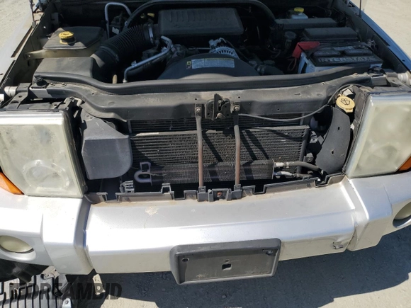 2007 Jeep Commander Limited with VIN 1J8HG58N07C573963, listed as a Copart auction lot 65088595 with 156,895 mi miles and Clean title. Bid and sale history available at DreamBid. Image 12.