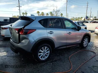 2014 Mazda CX-5 Touring with VIN JM3KE2CY8E0305641, listed as a Copart auction lot 42617165 with 107,336 mi miles and Salvage Title. Bid and sale history available at carsss.com. Image 3.