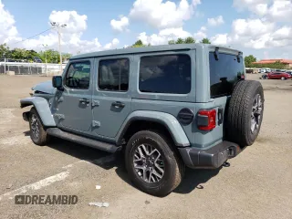 2024 Jeep Wrangler Sahara with VIN 1C4PJXEGXRW269062, listed as a Copart auction lot 64576895 with 2,159 mi miles and Salvage title. Bid and sale history available at DreamBid. Image 2.