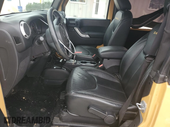 2014 Jeep Wrangler Sahara with VIN 1C4AJWBG8EL144691, listed as a Copart auction lot 71172514 with 111,322 mi miles and Salvage title. Bid and sale history available at DreamBid. Image 7.