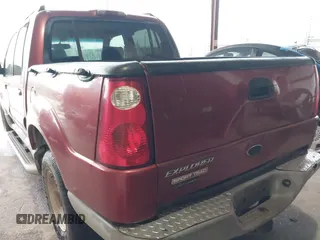 2002 Ford Explorer Sport Trac Value z VIN 1FMZU67E42UC82277, wystawiony jako IAAI lot #41903475 z przebiegiem 187 087 mil mil oraz . Historia ofert i sprzedaży dostępna na DreamBid. Obrazek 3.