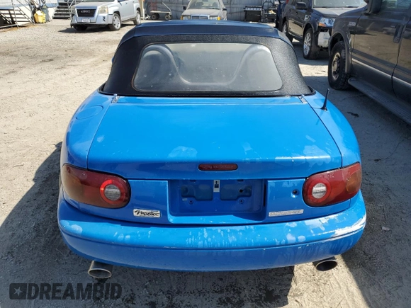 1991 Mazda MX-5 Miata Special Edition z VIN JM1NA3510M1218378, wystawiony jako Copart lot #57149615 z przebiegiem 147 632 mil mil oraz Czysty tytuł • Clean title. Historia ofert i sprzedaży dostępna na DreamBid. Obrazek 7.