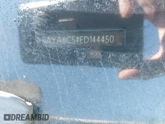 2014 BMW 7 Series 740i with VIN WBAYA6C54ED144450, listed as a IAAI auction lot 41680060 with 999,999 mi miles. Bid and sale history available at carsss.com. Image 16.