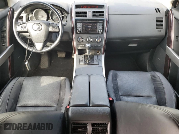 2014 Mazda CX-9 Grand Touring with VIN JM3TB3DV8E0428962, listed as a Copart auction lot 52512545 with 104,819 mi miles and Clean Title. Bid and sale history available at DreamBid. Image 8.