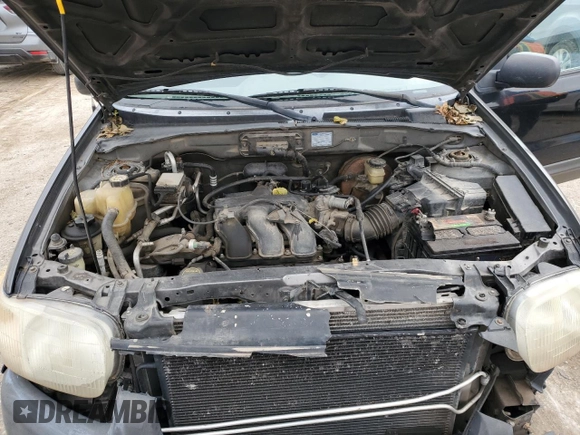 2002 Ford Escape XLS Choice with VIN 1FMYU02102KB67376, listed as a Copart auction lot 79109394 with 234,306 mi miles and Salvage title. Bid and sale history available at DreamBid. Image 12.