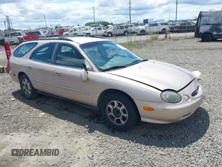 1999 Ford Taurus SE Standard with VIN 1FAFP58UXXG171761, listed as a IAAI auction lot 42525556 with 216,491 mi miles and . Bid and sale history available at DreamBid. Image 1.