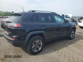 2019 Jeep Cherokee Trailhawk z VIN 1C4PJMBXXKD471338, wystawiony jako Copart lot #59880765 z przebiegiem 59 546 mil mil oraz Szkoda całkowita • Salvage title. Historia ofert i sprzedaży dostępna na DreamBid. Obrazek 3.