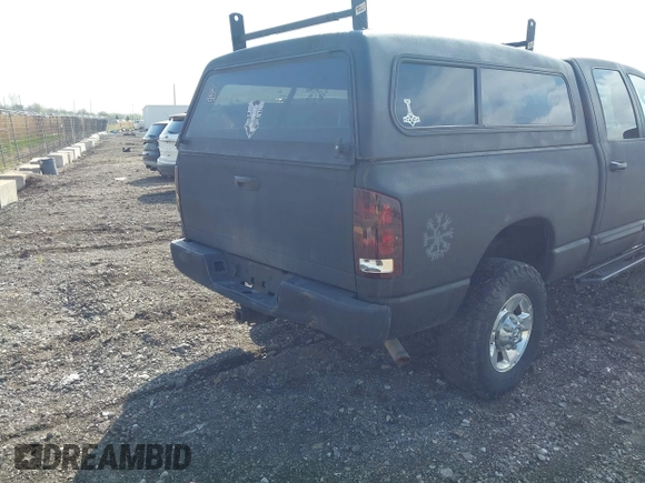 2005 Dodge 2500 SLT with VIN 3D7KS28C25G844501, listed as a IAAI auction lot 42176860 with 238,386 mi miles. Bid and sale history available at carsss.com. Image 4.