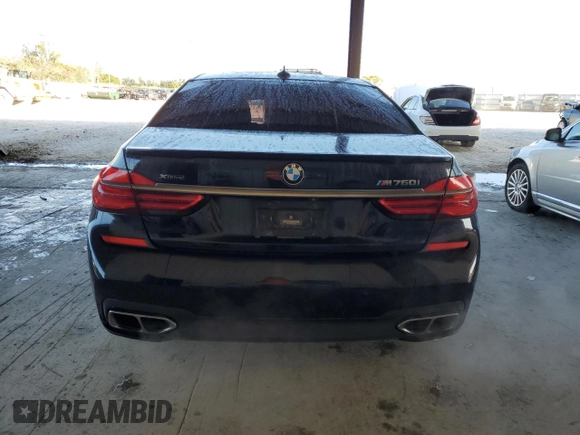 2019 BMW 7 Series M760i xDrive with VIN WBA7H6C55KG614986, listed as a Copart auction lot 84023164 with 59,222 mi miles and Non Repairable. Bid and sale history available at carsss.com. Image 6.