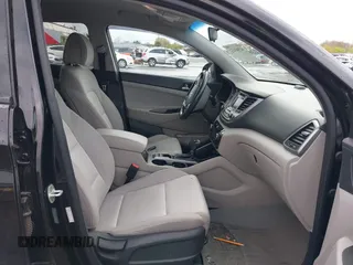2017 Hyundai Tucson Value with VIN KM8J3CA28HU394750, listed as a IAAI auction lot 41960452 with 138,134 mi miles. Bid and sale history available at carsss.com. Image 5.