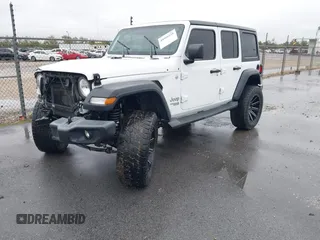 2019 Jeep Wrangler Unlimited Sport Altitude with VIN 1C4HJXDG3KW528647, listed as a IAAI auction lot 40986538 with 85,381 mi miles and . Bid and sale history available at DreamBid. Image 18.