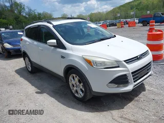2013 Ford Escape SE with VIN 1FMCU0G90DUB37052, listed as a IAAI auction lot 42132973 with 169,975 mi miles and . Bid and sale history available at DreamBid. Image 1.