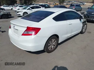 2012 Honda Civic Cpe LX with VIN 2HGFG3B5XCH564353, listed as a IAAI auction lot 42109955 with 158,331 mi miles. Bid and sale history available at carsss.com. Image 4.