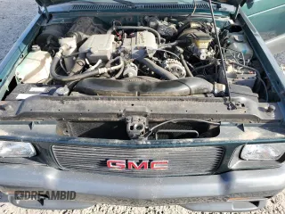 1993 GMC Jimmy z VIN 1GDCT18Z9P0810178, wystawiony jako Copart lot #79442614 z przebiegiem 19 514 mil mil oraz Szkoda całkowita • Salvage title. Historia ofert i sprzedaży dostępna na DreamBid. Obrazek 11.