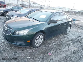 2014 Chevrolet Cruze LS with VIN 1G1PA5SHXE7282148, listed as a IAAI auction lot 41209200 with 150,769 mi miles. Bid and sale history available at carsss.com. Image 2.