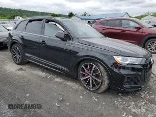 2023 Audi SQ7 Prestige z VIN WA1VWBF74PD004778, wystawiony jako Copart lot #55252164 z przebiegiem Nie podano mil oraz . Historia ofert i sprzedaży dostępna na DreamBid. Obrazek 4.