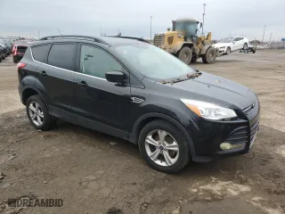 2014 Ford Escape SE with VIN 1FMCU0GXXEUE56345, listed as a Copart auction lot 82538804 with 156,555 mi miles and Clean Title. Bid and sale history available at carsss.com. Image 4.