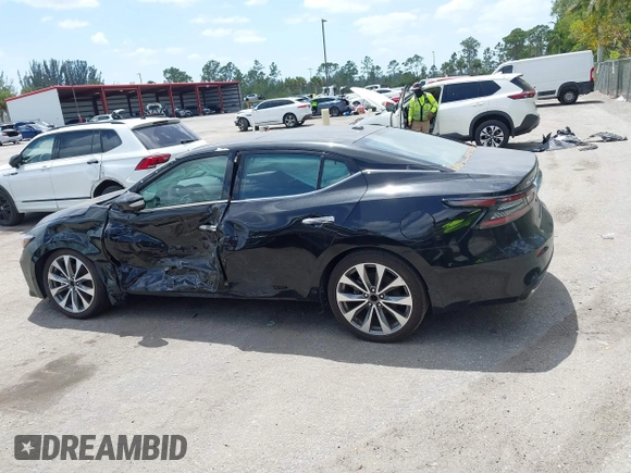 2023 Nissan Maxima Platinum z VIN 1N4AA6FV0PC502349, wystawiony jako IAAI lot #42114011 z przebiegiem 7 494 mil mil oraz . Historia ofert i sprzedaży dostępna na DreamBid. Obrazek 14.