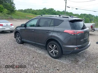 2016 Toyota RAV4 XLE with VIN 2T3RFREV4GW494108, listed as a IAAI auction lot 42234227 with 102,216 mi miles and . Bid and sale history available at DreamBid. Image 3.