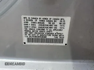 2006 Honda Ridgeline RTL z VIN 2HJYK16506H536386, wystawiony jako Copart lot #56457495 z przebiegiem 305 168 mil mil oraz Szkoda całkowita • Salvage title. Historia ofert i sprzedaży dostępna na DreamBid. Obrazek 12.
