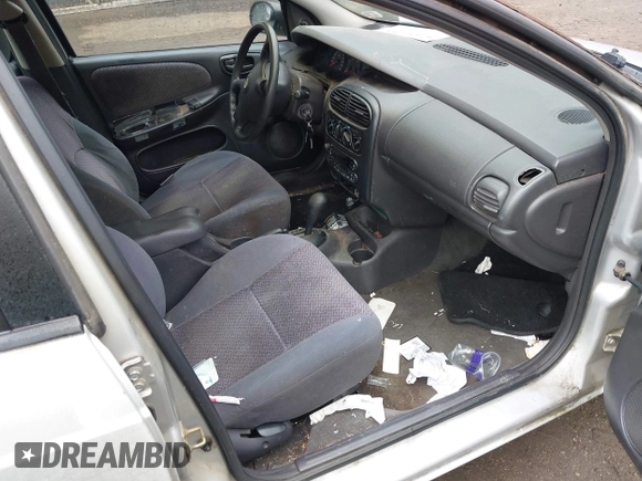 2000 Dodge Neon Highline z VIN 1B3ES46C5YD731845, wystawiony jako IAAI lot #42436755 z przebiegiem 177 211 mil mil oraz . Historia ofert i sprzedaży dostępna na DreamBid. Obrazek 5.