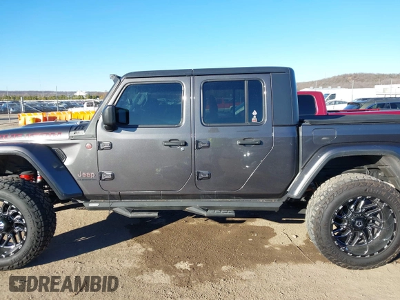 2020 Jeep Gladiator Rubicon with VIN 1C6JJTBG5LL179188, listed as a IAAI auction lot 41316367 with 136,670 mi miles and . Bid and sale history available at DreamBid. Image 14.