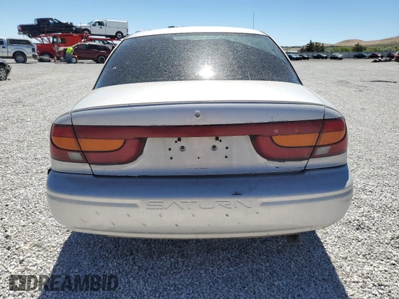 2001 Saturn SL with VIN 1G8ZK52731Z237050, listed as a Copart auction lot 60977394 with Not provided miles and Salvage title. Bid and sale history available at DreamBid. Image 6.